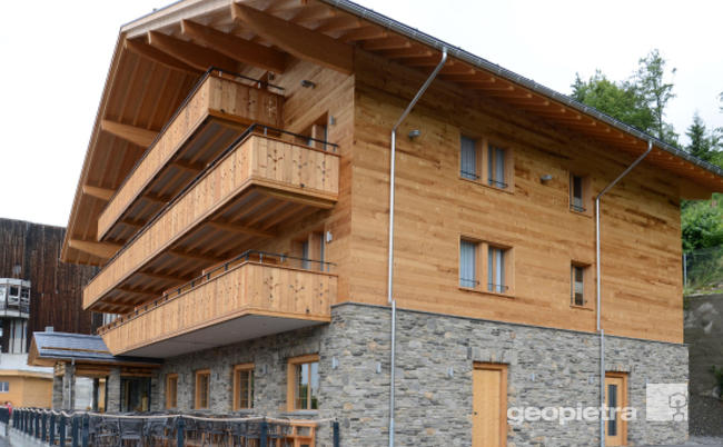 hotel restyling wood stone alpinestyle facade
