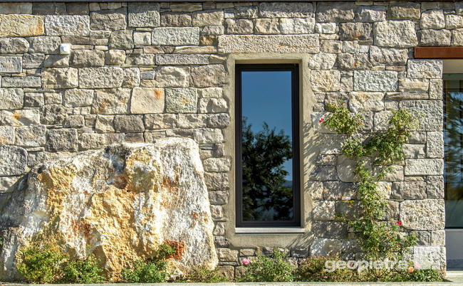 villa moderna pietra corten vetro